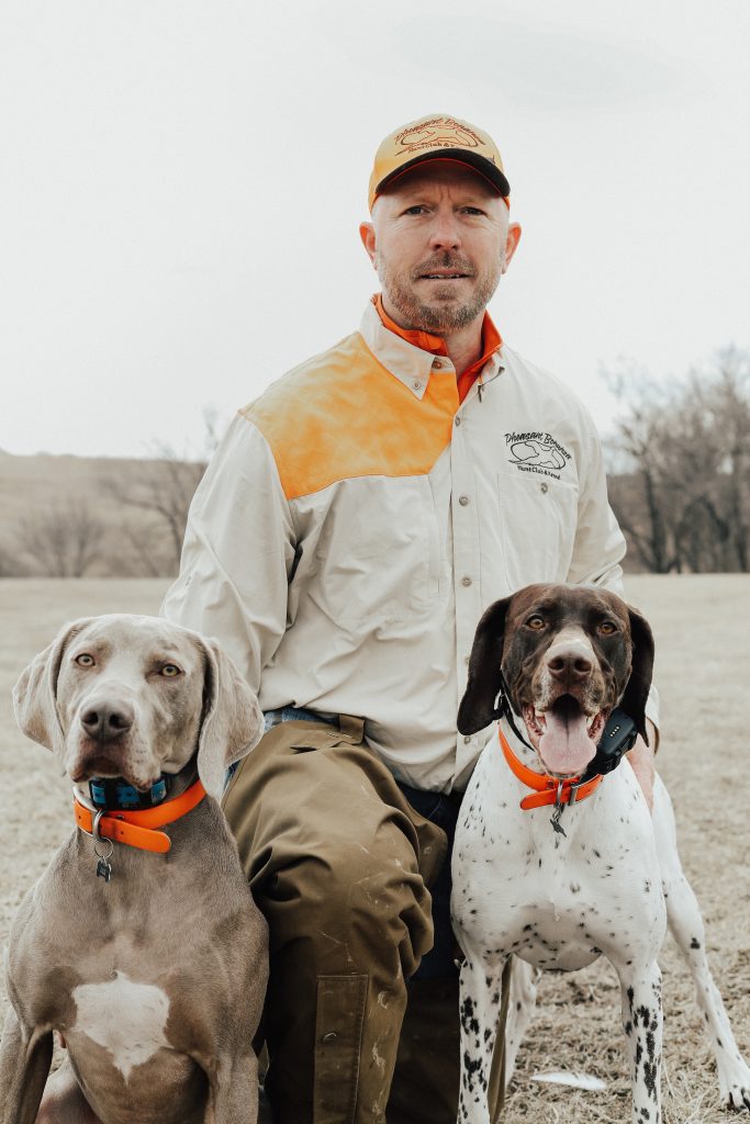 Paul Carrier with dogs, Jax and Mabel